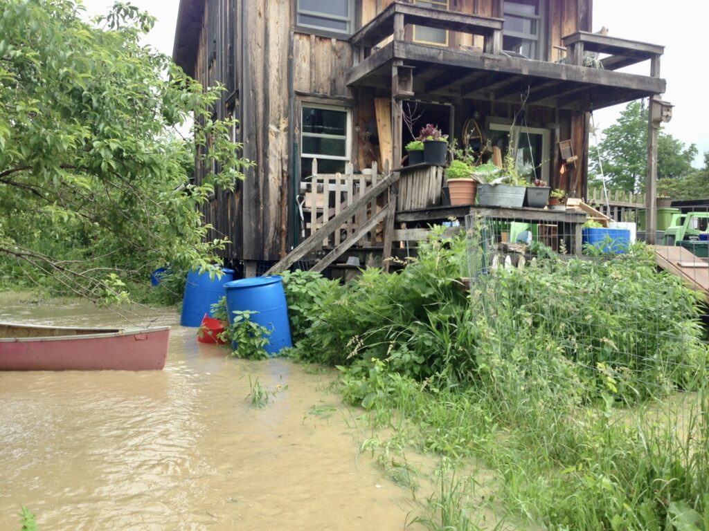 The shabin during a flood that covered our valley, luckily it was built on stilts.